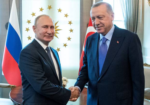 FILE PHOTO: Russian President Putin and Turkish President Erdogan meet in Ankara