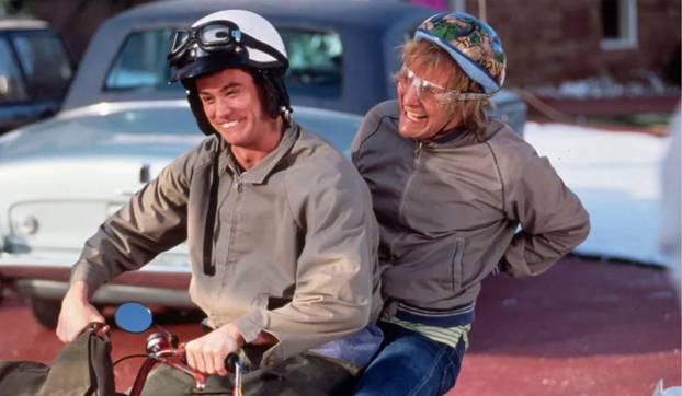 DUMB AND DUMBER 1994 New Line Cinema film with Jim Carrey at left and Jeff Daniels