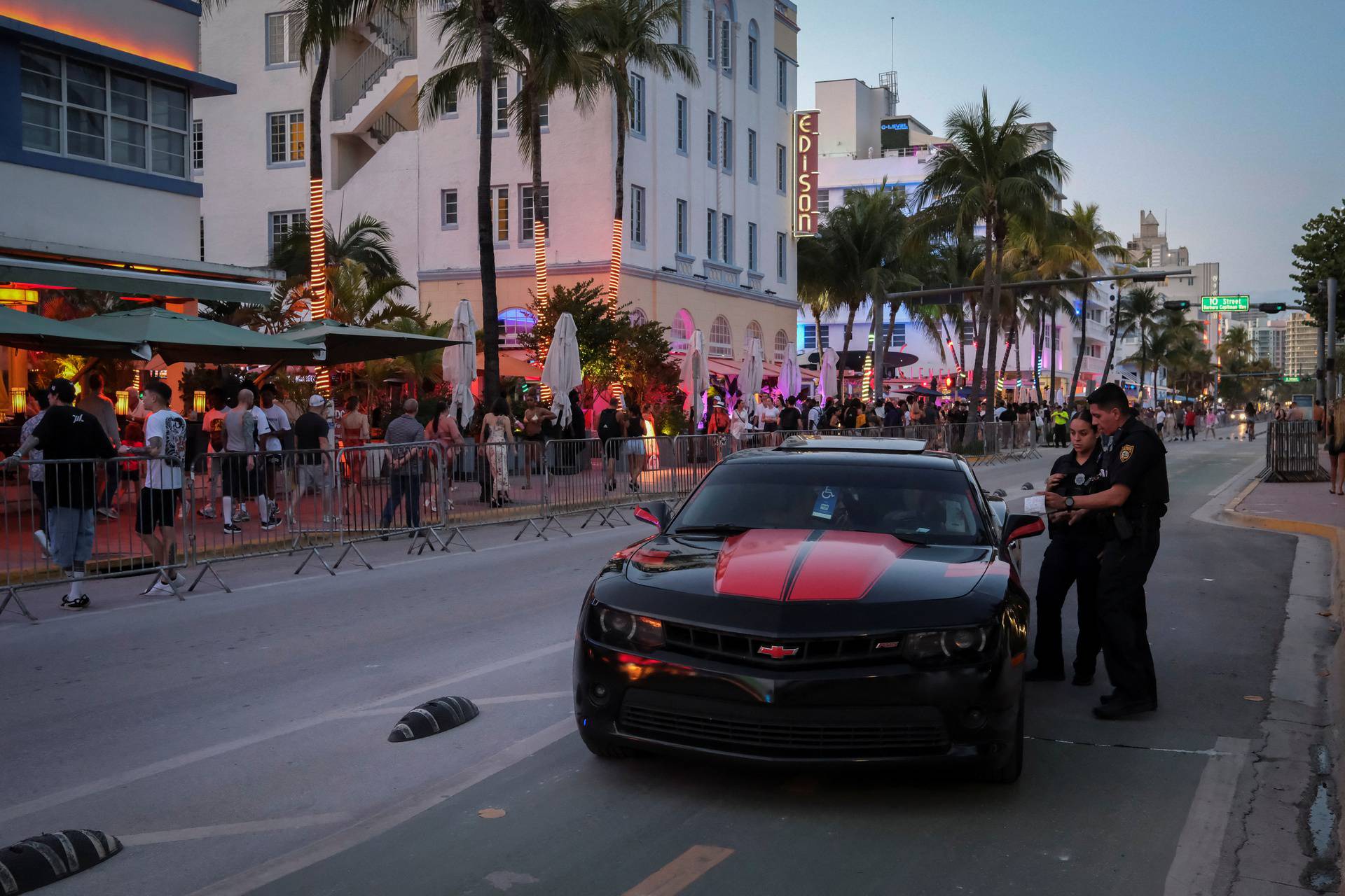 Authorities enforce rules to curb the chaos and violence during spring break in Miami Beach
