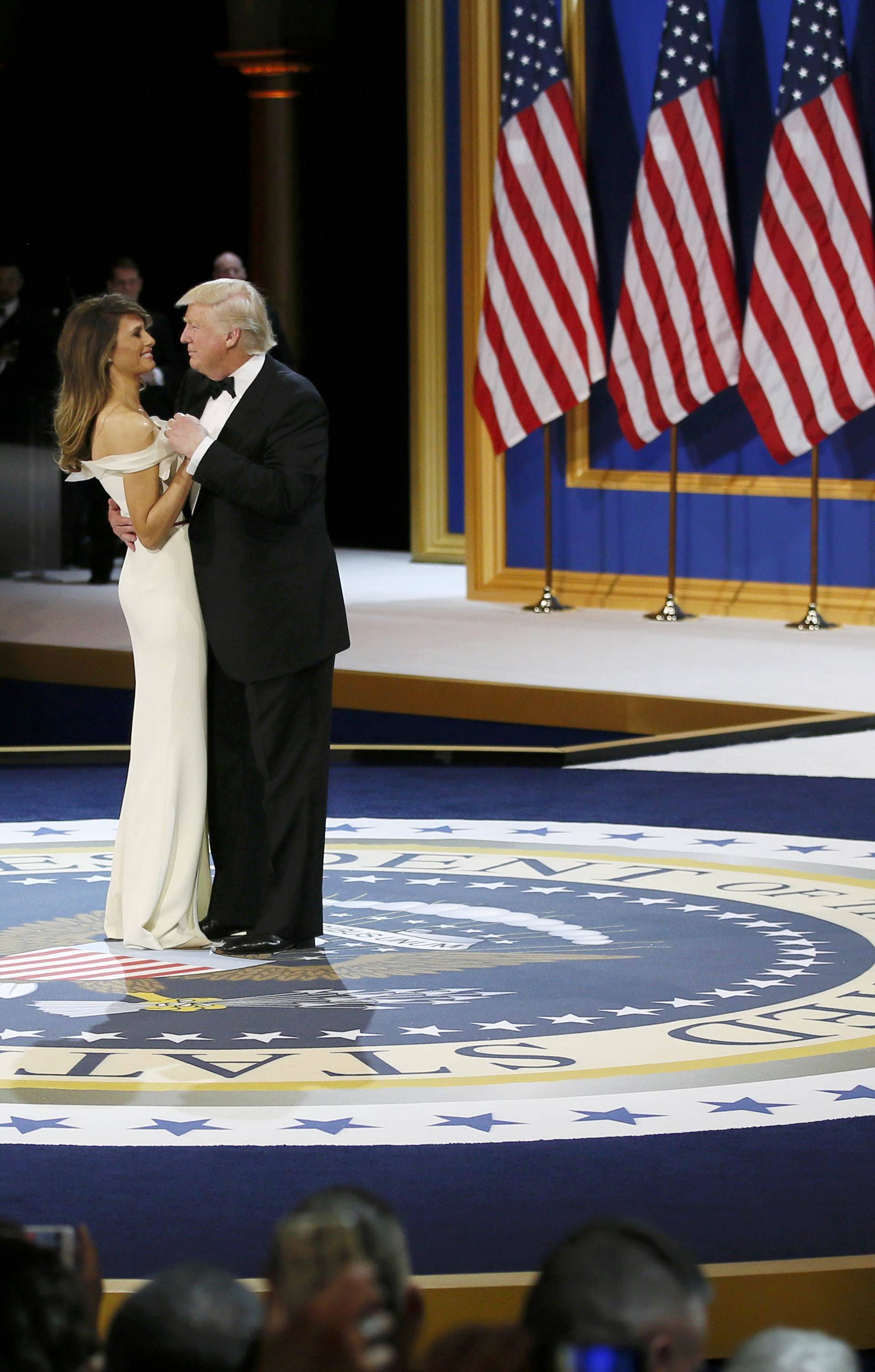 U.S. President Donald Trump and his wife first lady Melania Trump dance at the "Salute to Our Armed Forces" inaugural ball during inauguration festivites in Washington