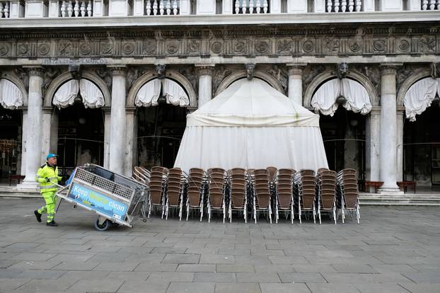 Chairs are seen outside the closed Caff? Florian after the Italian government imposed a virtual lockdown on the north of Italy including Venice to try to contain a coronavirus outbreak, in Venice