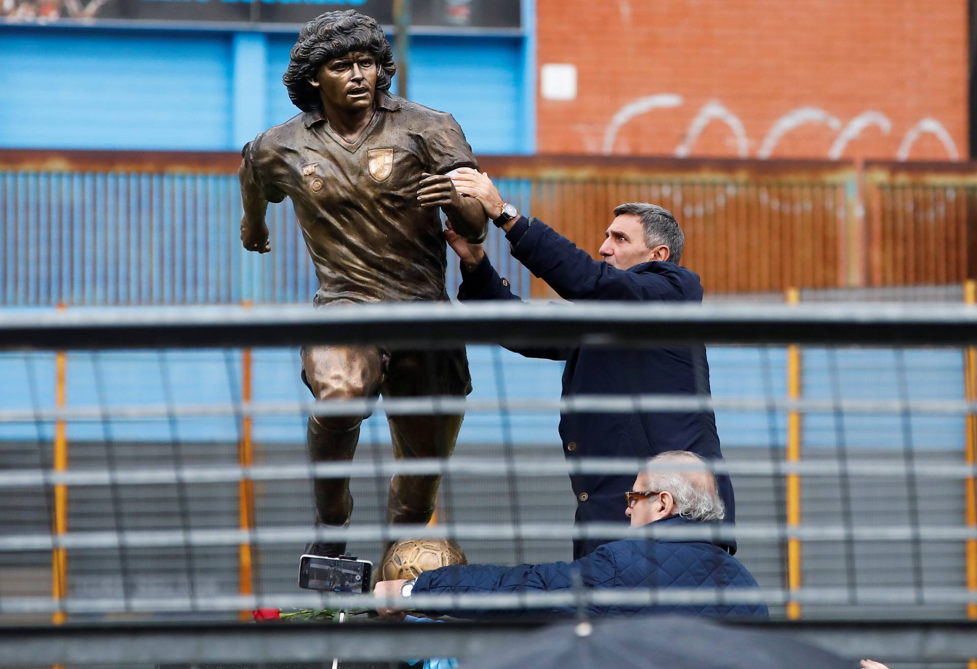 A statue of Argentinean soccer legend, Diego Armando Maradona, is unveiled in Naples