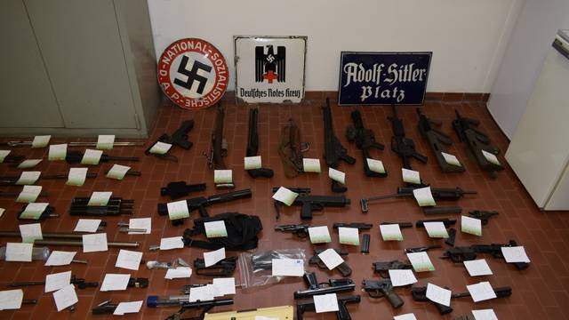 Italian Police handout shows weapons seized in raids on neo-Nazi sympathisers, in Turin