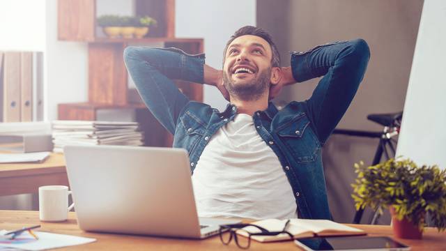 Satisfied,With,Work,Done.,Happy,Young,Man,Working,On,Laptop