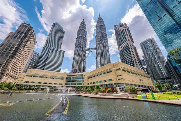 Petronas Towers and city buildings at KLCC Park