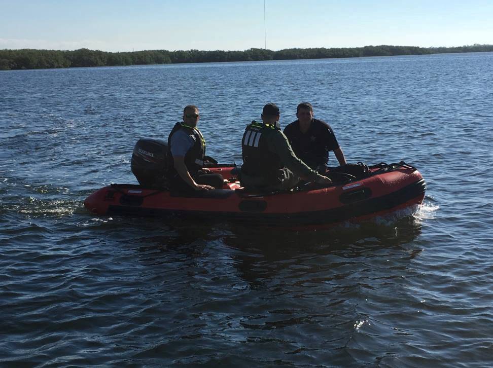 A crew from the Pasco Sheriff's office work at the scene of a plane crash where retired Major League Baseball pitcher Roy Halladay died, in New Port Richey, Florida