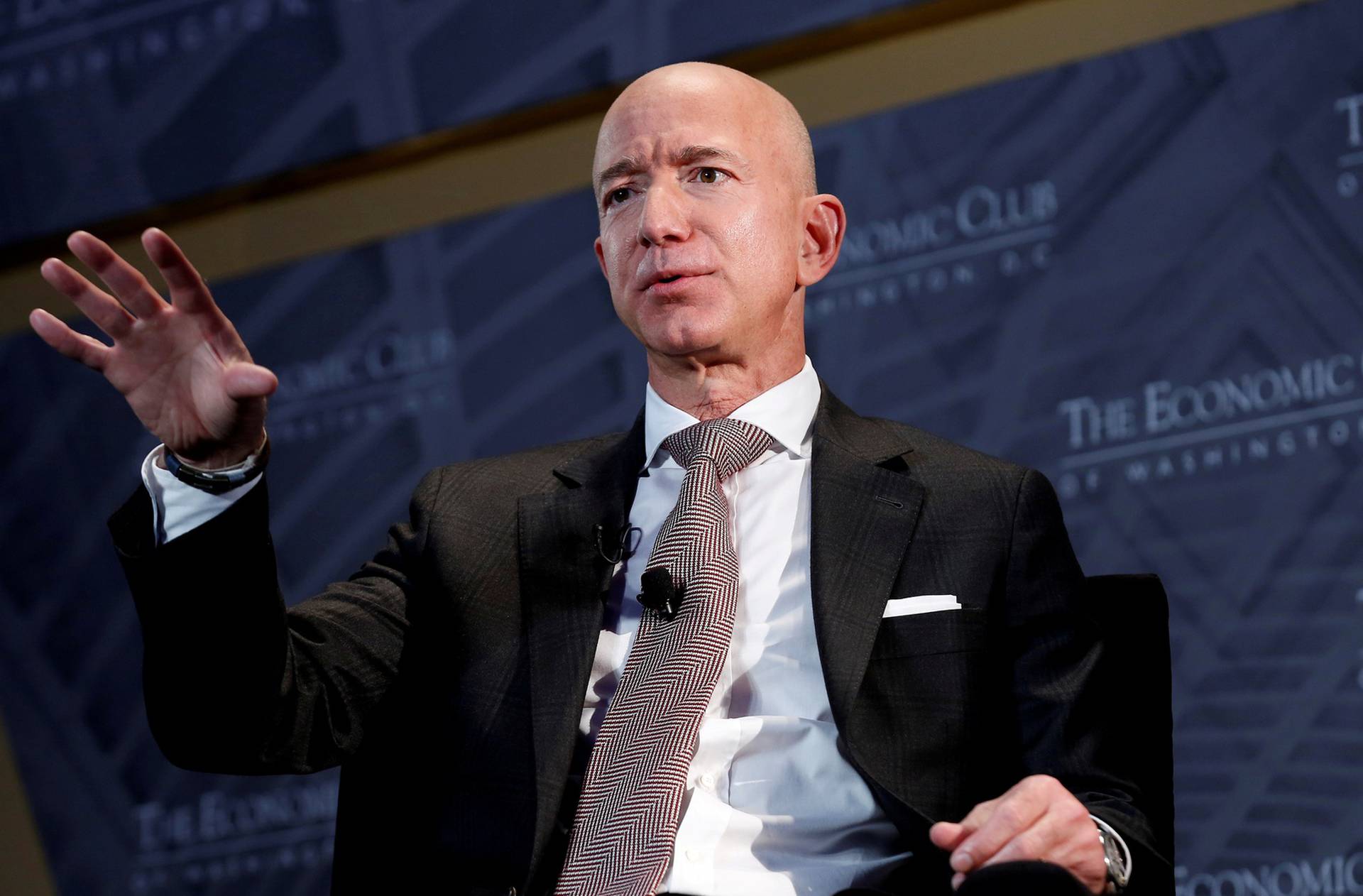 FILE PHOTO: Jeff Bezos, president and CEO of Amazon and owner of The Washington Post, speaks at the Economic Club of Washington DC's "Milestone Celebration Dinner" in Washington