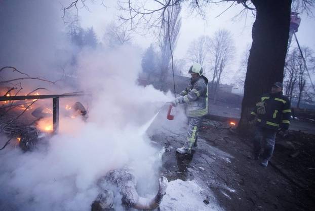 A view shows an affected area following an attack on a television tower in Kyiv