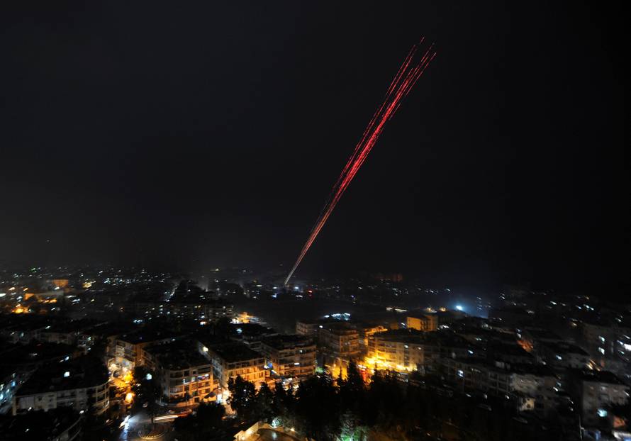 Govermental Syrian forces fires into sky as celebrating their victory against rebels in eastern Aleppo