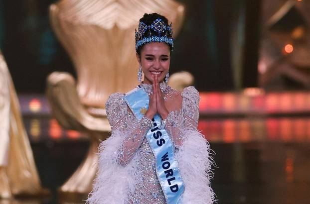 Thailand's Opal Suchata Chuangsri reacts after being crowned Miss World at the 72nd Miss World finale in Hyderabad