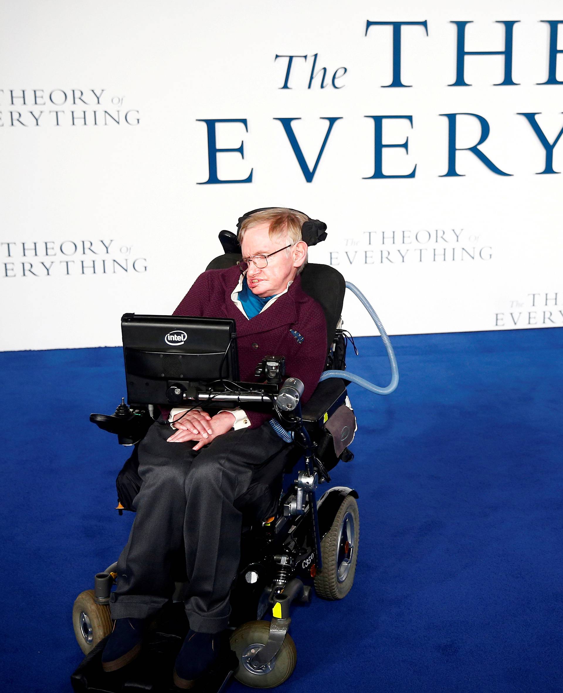 FILE PHOTO: Stephen Hawking arrives at the UK premiere of the film "The Theory of Everything" which is based around his life, at a cinema in central London