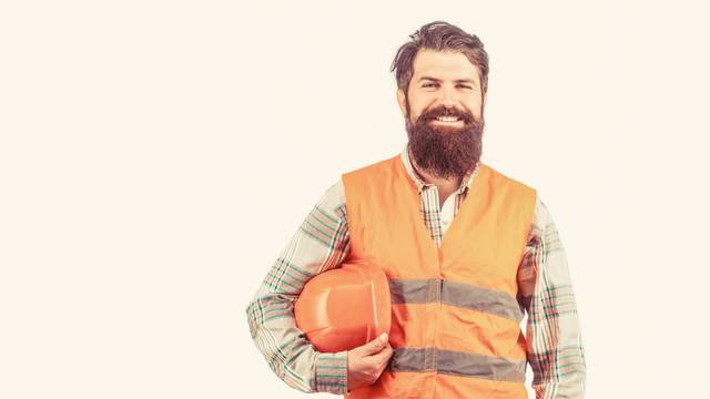 Bearded,Man,Worker,In,Building,Helmet,Or,Hard,Hat.,Portrait