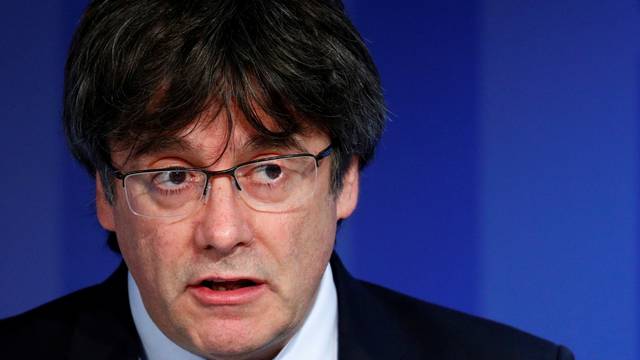 Former Catalan President Carles Puigdemont holds a news conference in Brussels