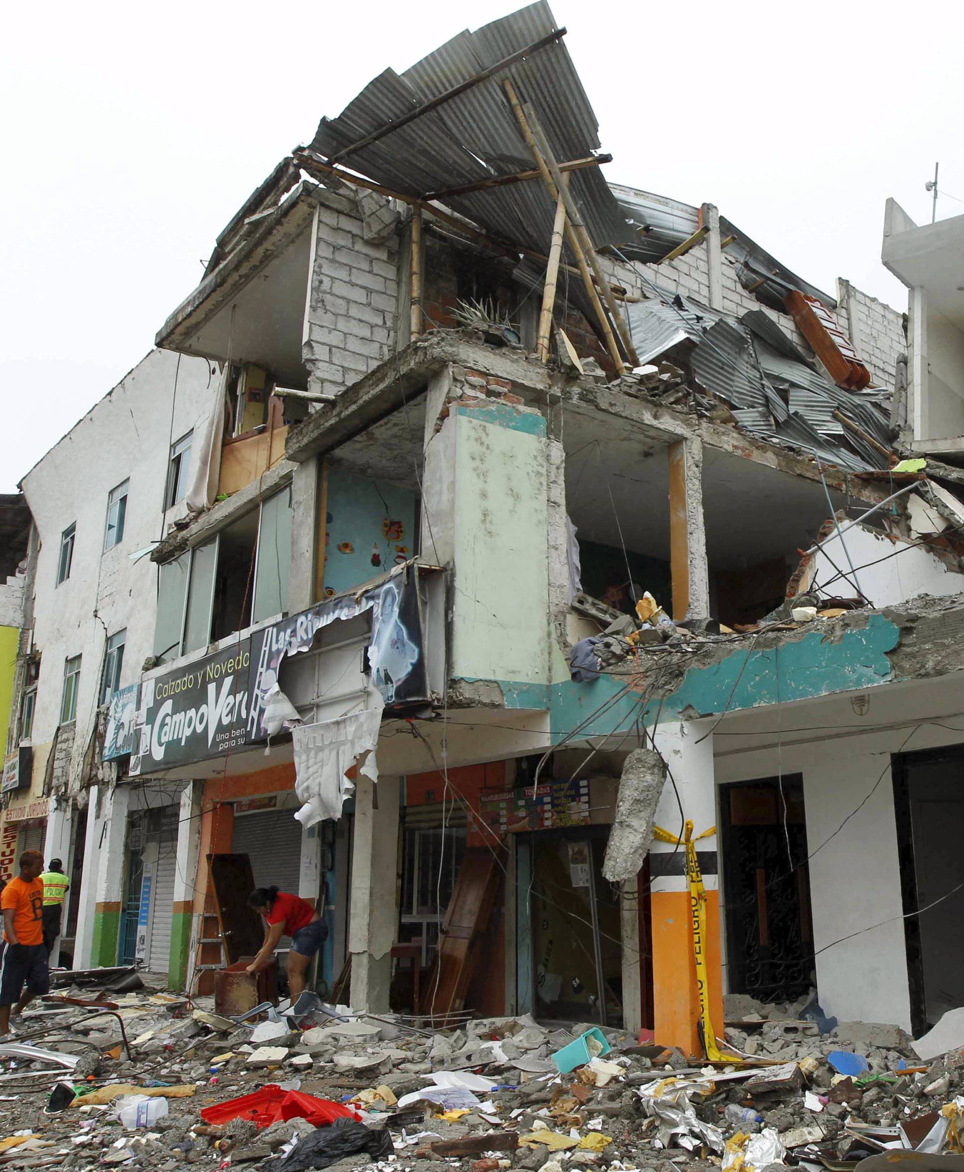 A collapsed building is seen in Pedernales, after an earthquake struck off Ecuador's Pacific coast