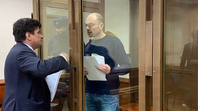 Russian opposition leader Vladimir Kara-Murza attends a court hearing in Moscow