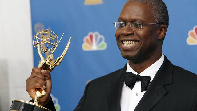 FILE PHOTO: Braugher poses after winning an Emmy for outstanding lead actor in a miniseries or movie for his work on "Thief" in Los Angeles
