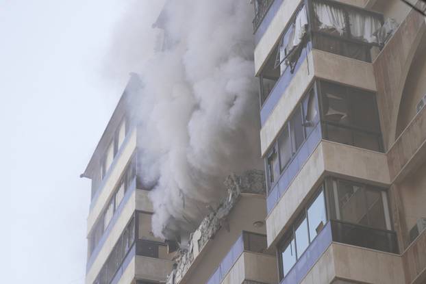 Smoke rises from a building following an Israeli air strike in Beirut