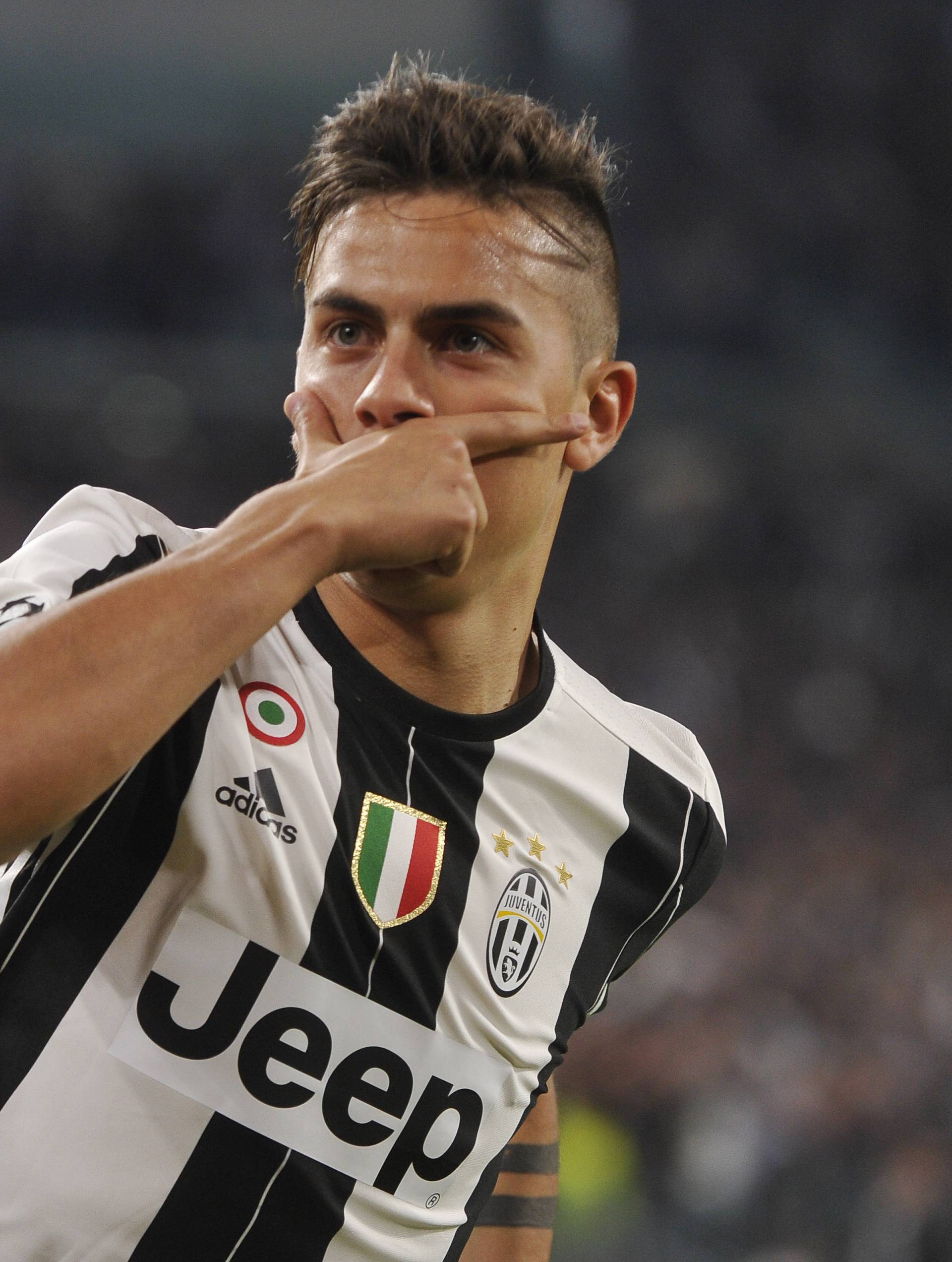 Juventus' Paulo Dybala celebrates scoring their first goal