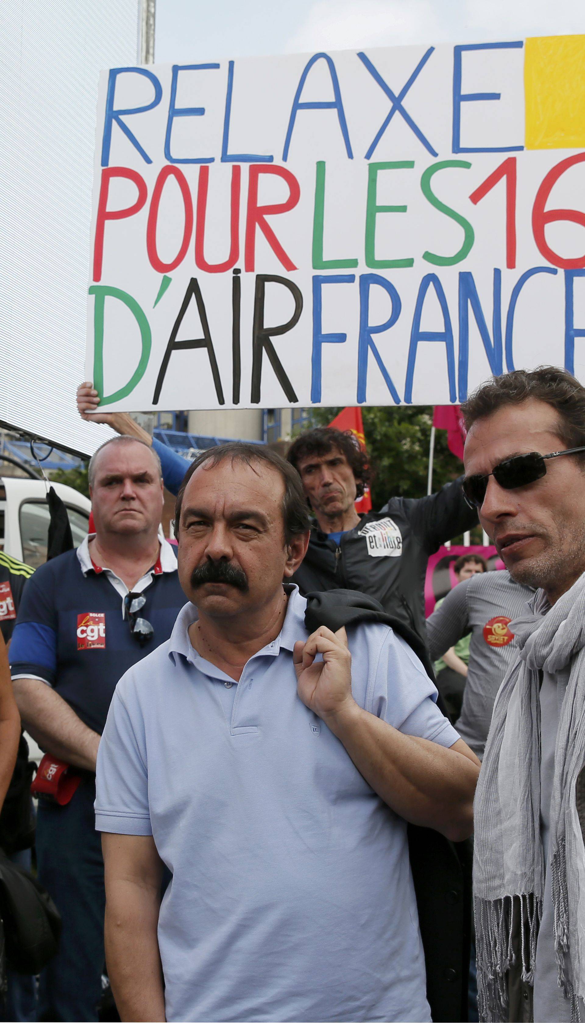  French CGT trade union general secretary Philippe Martinez arrives to speak to union members who gathered for the start of the trial of Air France employees near the courthouse in Bobigny