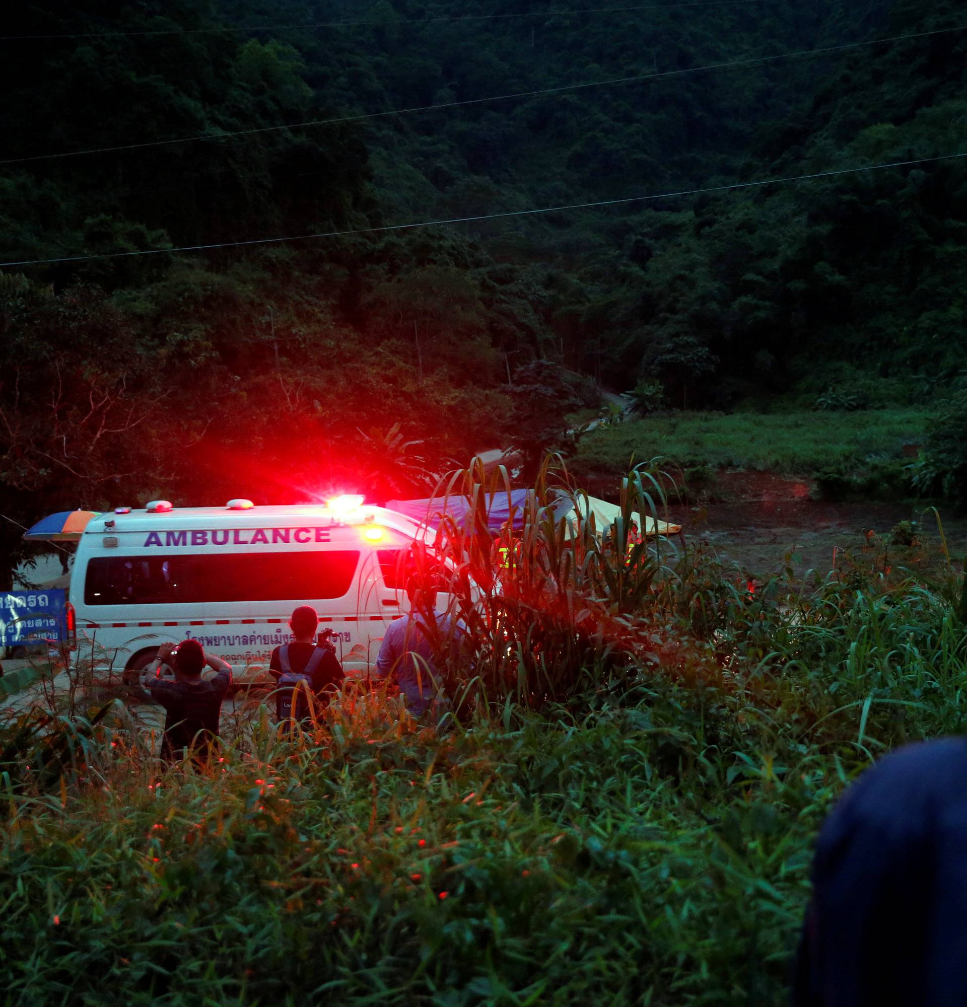 An ambulance leaves from Tham Luang cave complex in the northern province of Chiang Rai