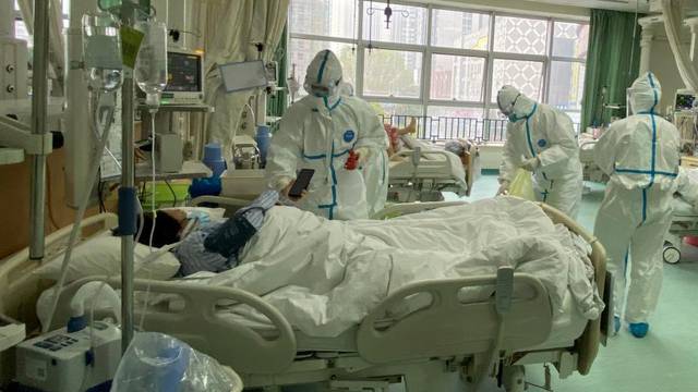Pictures uploaded to social media on January 25, 2020 by the Central Hospital of Wuhan show medical staff attending to patients, in Wuhan, China