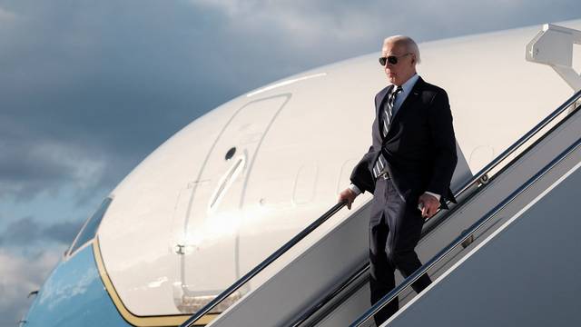 U.S. President Joe Biden disembarks from Air Force One at Dover Air Force Base, in Dover