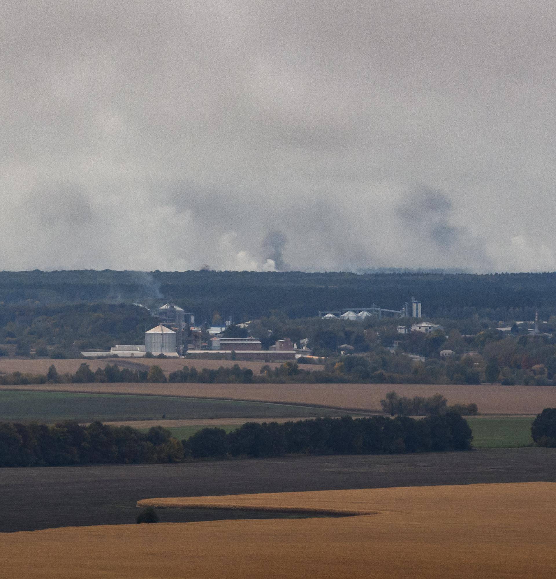 Smoke rises after a fire and explosions hit the Ukrainian defence ministry ammunition depot in the eastern Chernigov region