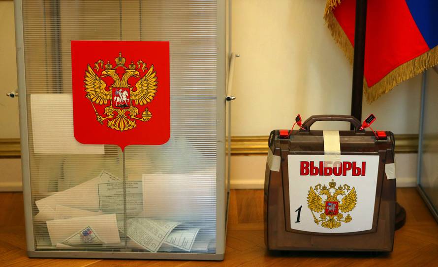 Ballot boxes are seen at a polling station inside the Russian Embassy, in London
