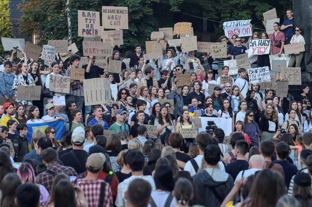 Ukrainians protest against a newly passed law, which curbs independence of anti-corruption institutions in central Lviv