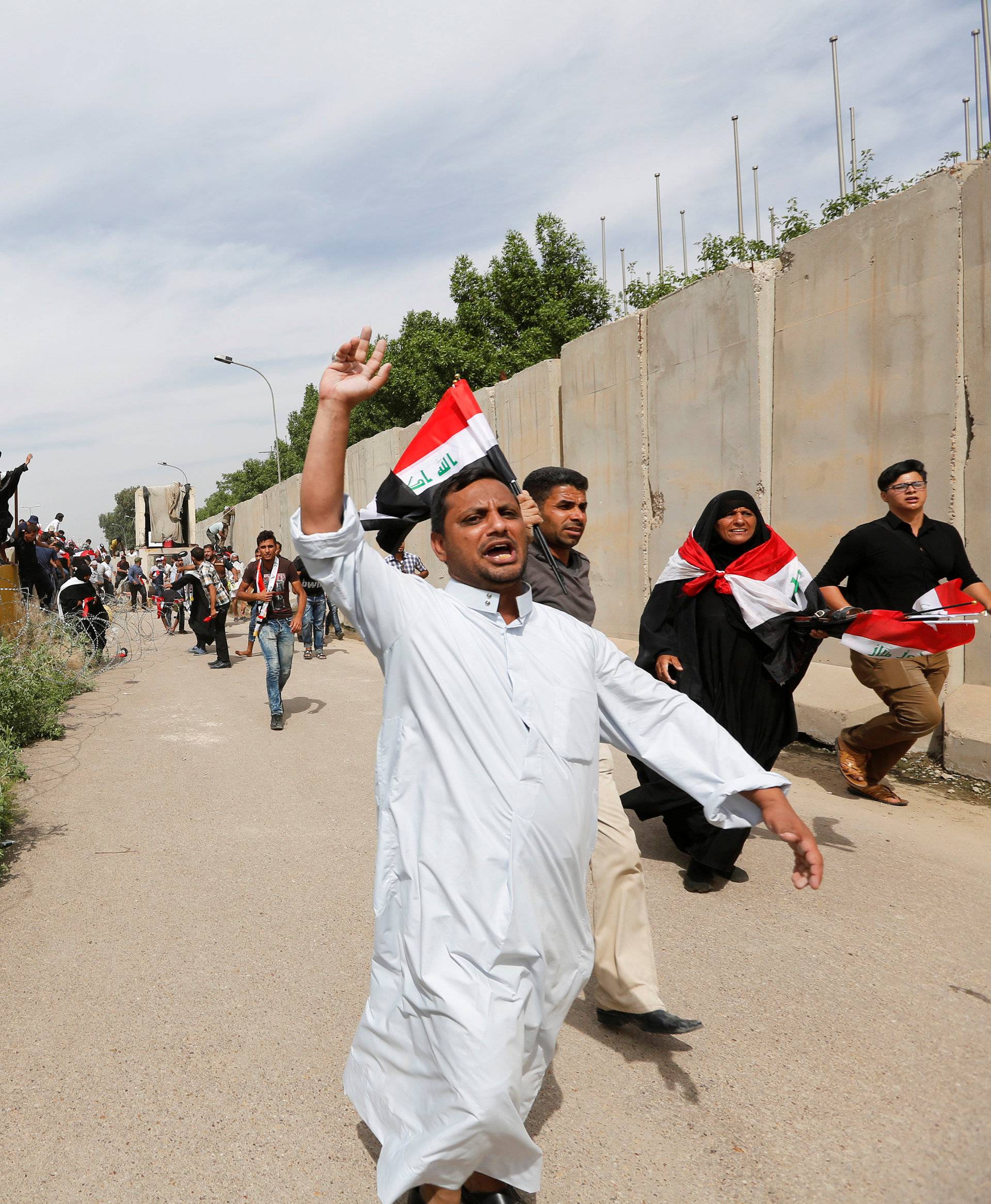 Followers of Iraq's Shi'ite cleric Moqtada al-Sadr storm Baghdad's Green Zone after lawmakers failed to convene for a vote on overhauling the government, in Iraq 