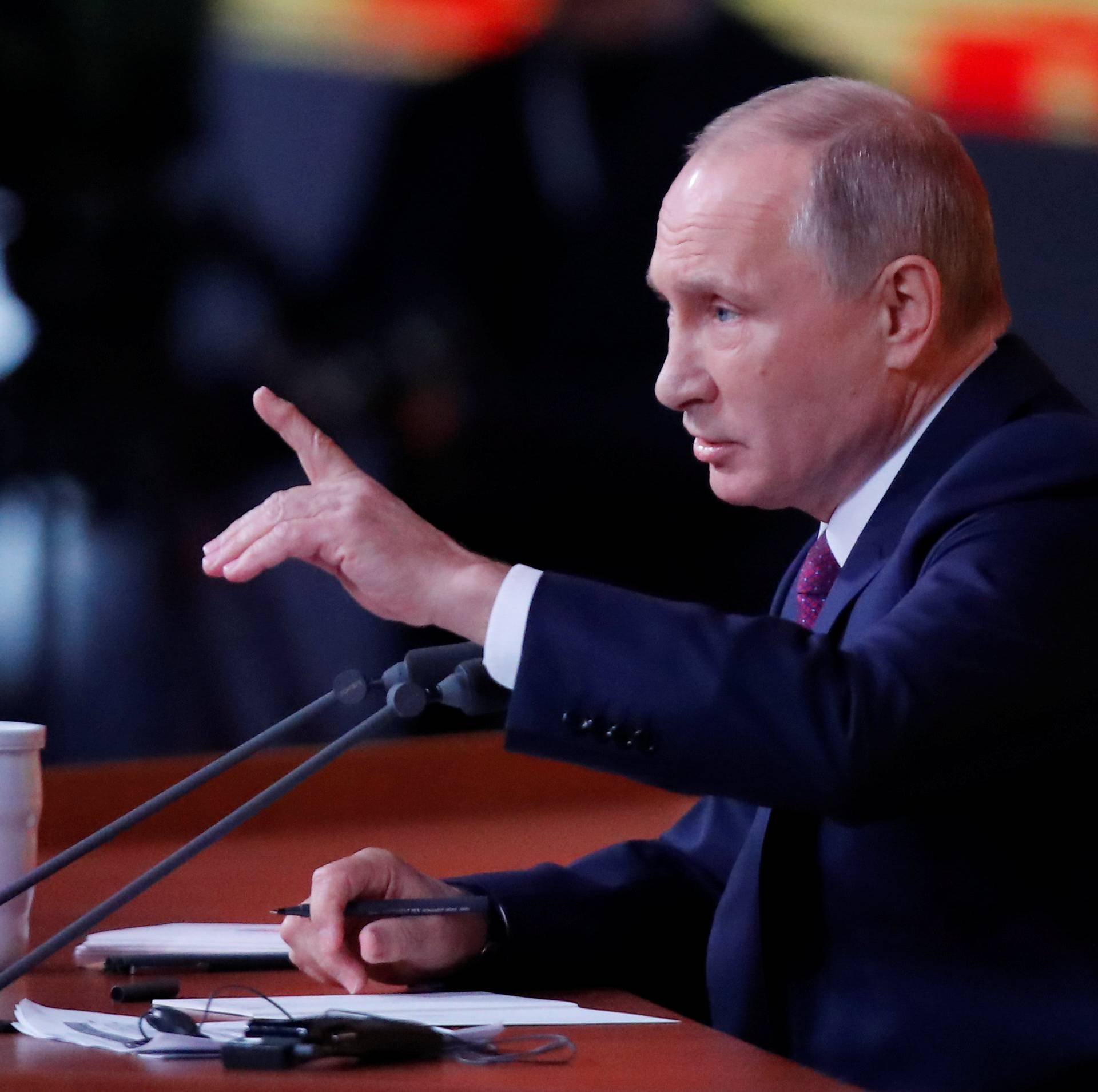 Russian President Vladimir Putin speaks during his annual end-of-year news conference in Moscow