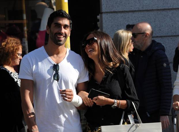 Milan, Filippo Magnini and Giorgia Palmas shopping at Falconeri