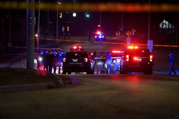 Police officers respond to a shooting at Michigan State University