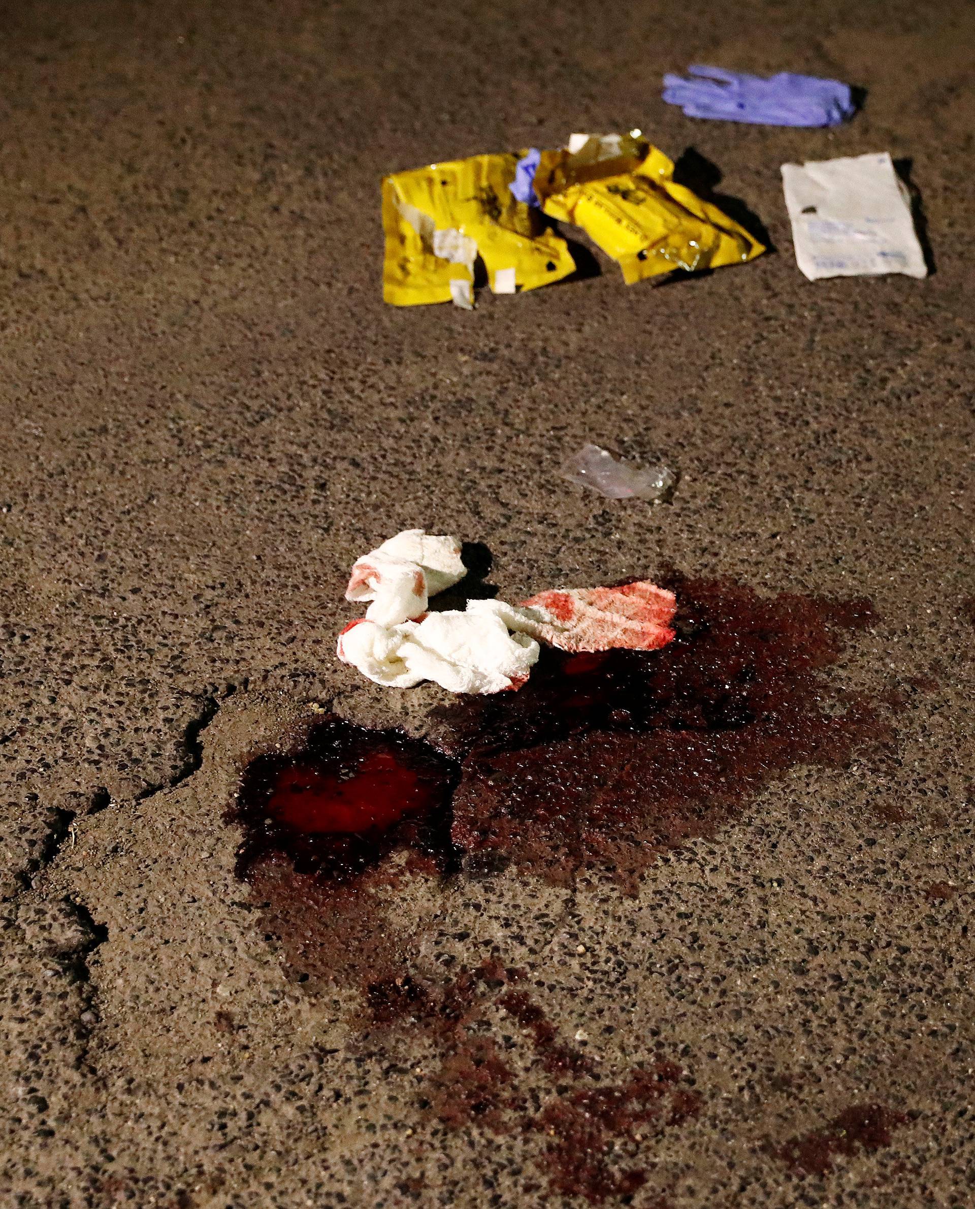 Blood is seen at the scene where a man with an axe attacked passengers on a train near the city of Wuerzburg