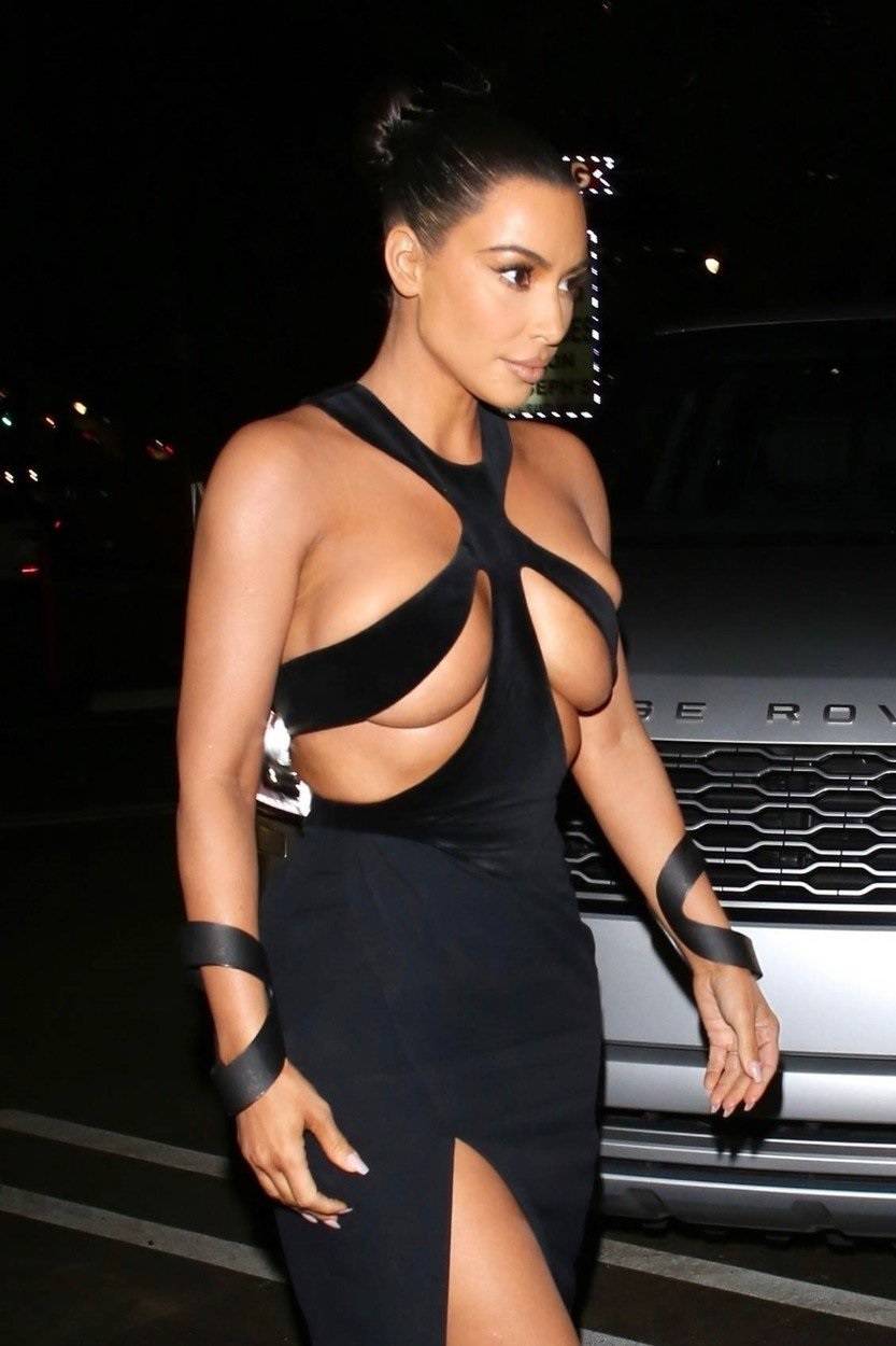 Kim Kardashian shows some skin in a very risquÃ© dress while out and about in Los Angeles