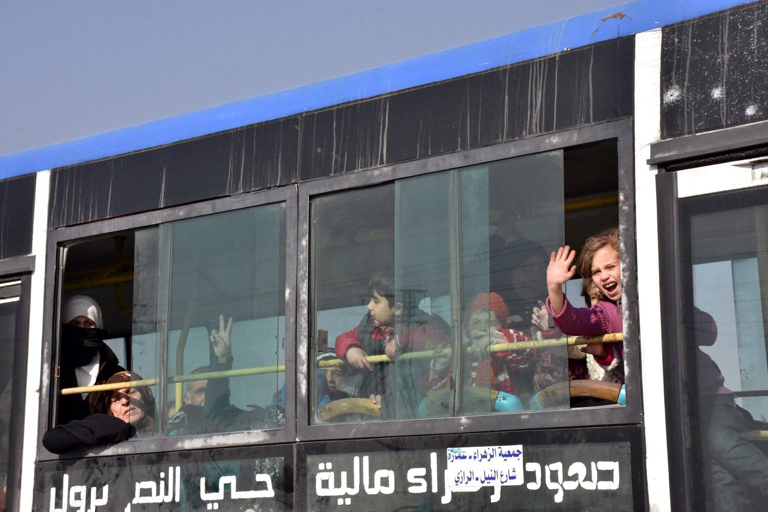 People who fled the Shi'ite Muslim villages of al-Foua and Kefraya arrive in government controlled Jibreen area in Aleppo