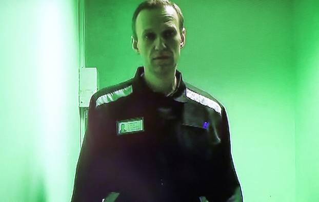 FILE PHOTO: Kremlin critic Navalny appears in court via video link in Kovrov