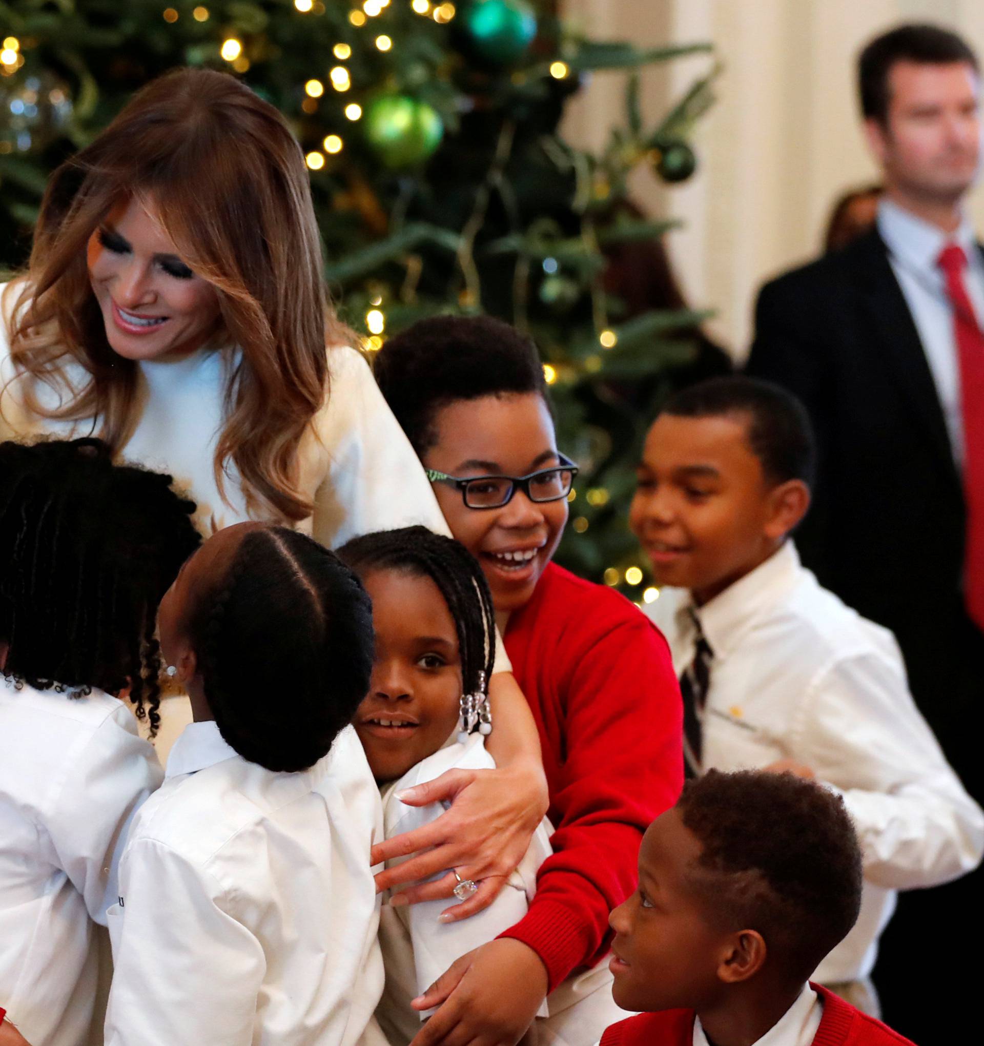 Trump tours the holiday decorations with reporters at the White House in Washington