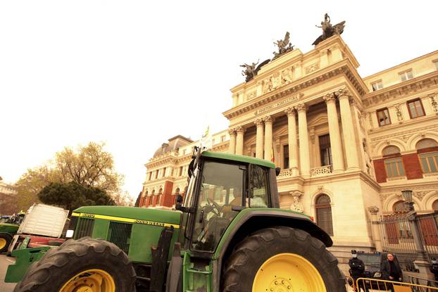 Farmers protest in the center of Madrid on a day of haze from the Sahara