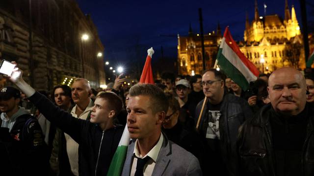 Peter Magyar, a lawyer and businessman formerly close to Hungary's ruling nationalist government, attends a protest demanding the chief prosecutor Polt and Prime Minister Orban to resign, in Budapest