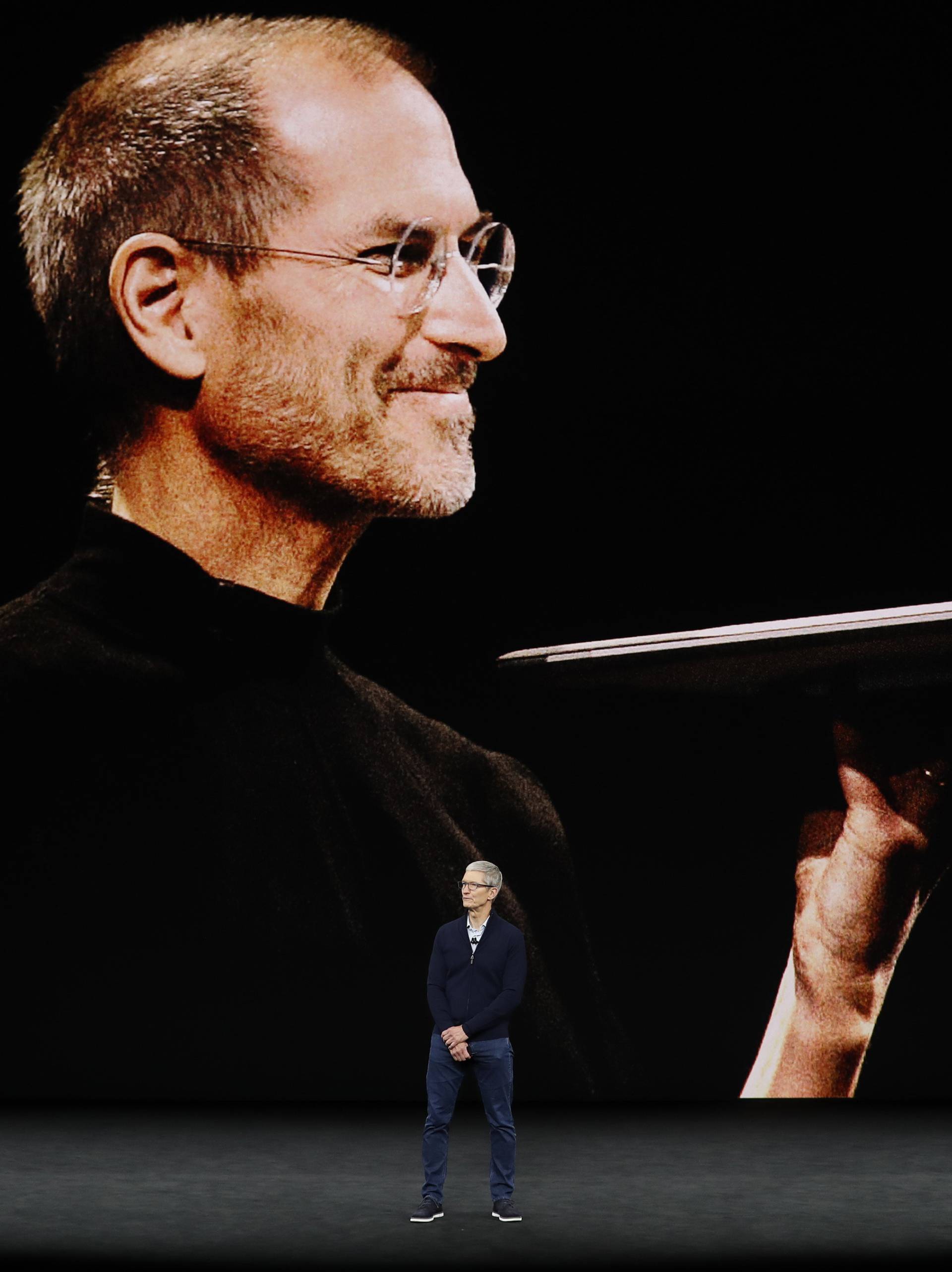 Apple's Tim Cook speaks during a product launch event in Cupertino