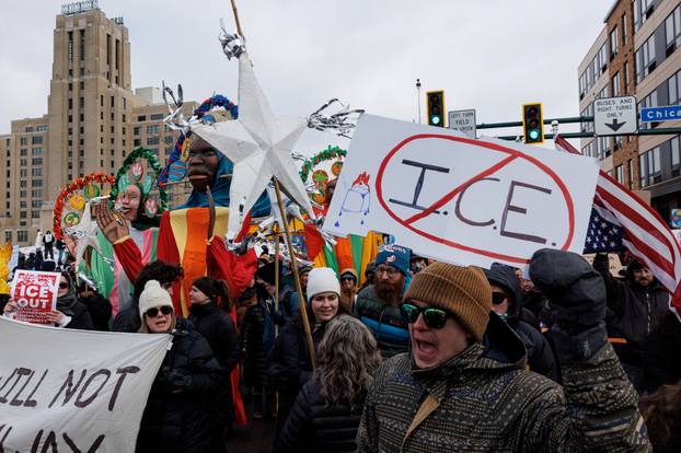 People protest against increased immigration enforcement after the fatal shooting of Renee Nicole Good by a U.S. Immigration and Customs Enforcement (ICE) agent, in Minneapolis