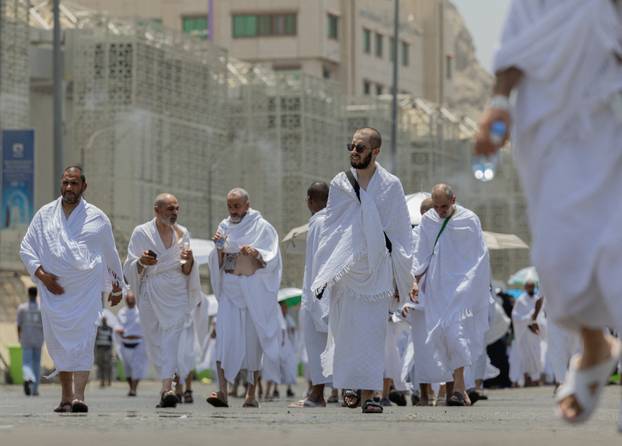 Muslims make their way to Mina during hajj pilgrimage from the holy city of Mecca, Saudi Arabia