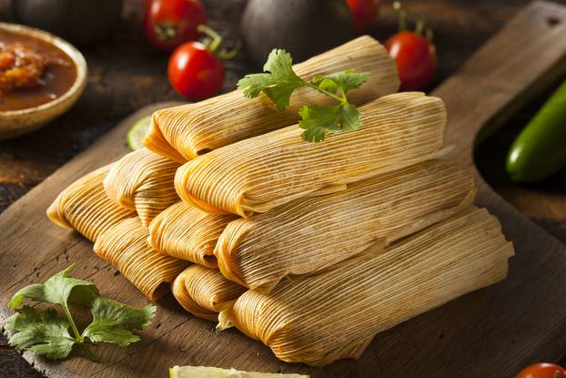 Homemade,Corn,And,Chicken,Tamales,Ready,To,Eat