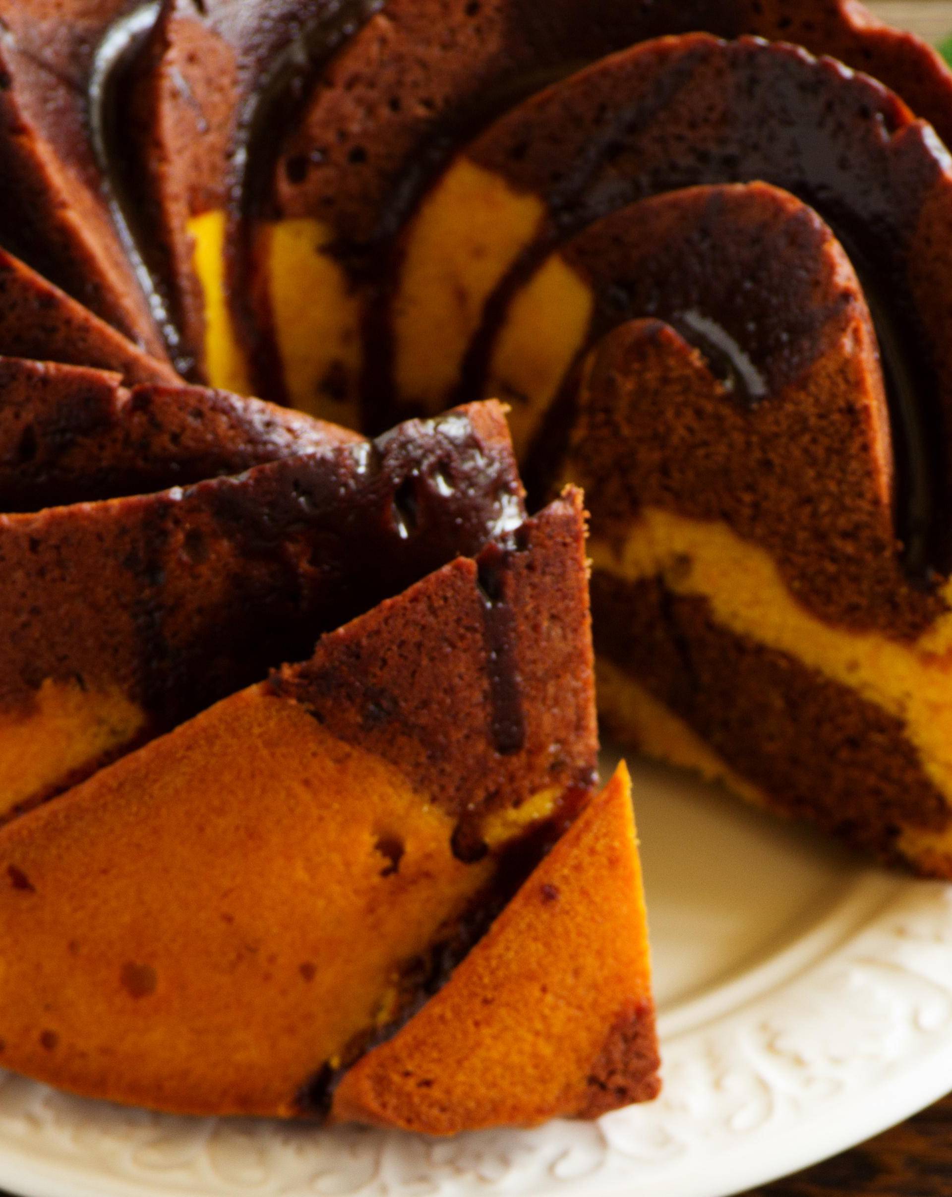 Pumpkin chocolate cake with frosting.