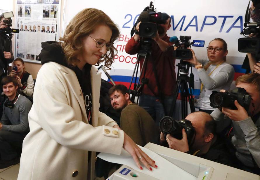 Presidential candidate Sobchak casts a ballot at a polling station during the presidential election in Moscow