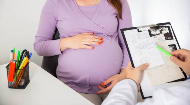 Pregnant,Girl,At,The,Doctor's,Consultation.,The,Results,Of,Blood