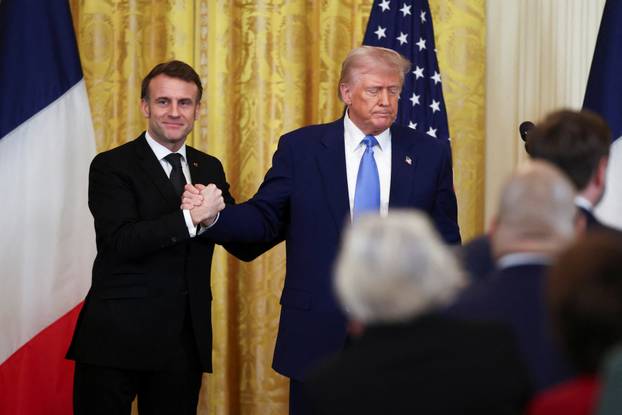U.S. President Donald Trump and French President Emmanuel Macron hold a press conference, in Washington