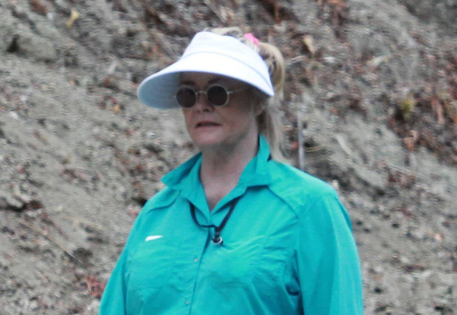 Reclusive Hollywood veteran Cybill Shepherd, 72, is seen out and about in her LA neighborhood for the first time in TWO YEARS as she walks her dogs with a helper.