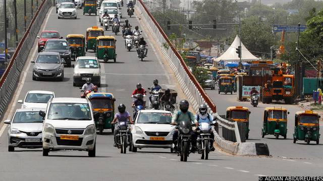 FILE PHOTO: Traffic moves on a flyover in New Delhi